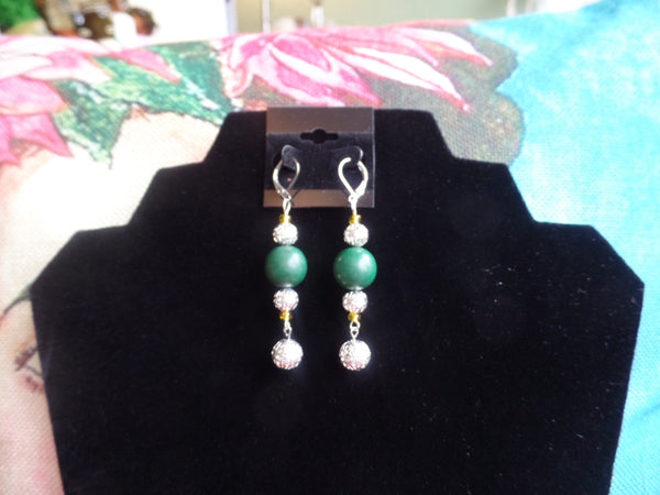Green Acrylic Rounds w/silver & gold round accents on Sterling Silver Ear Wire.