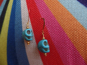 Turquoise Acrylic Skulls w/Gold accents on Gold Ear Wire